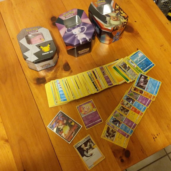 Pokemon tins and bulk bundle W/ 25th anniversary cards